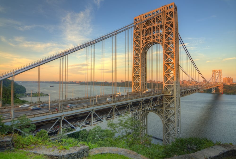 The George Washington Bridge spanning the Hudson River at twilight in New York City.