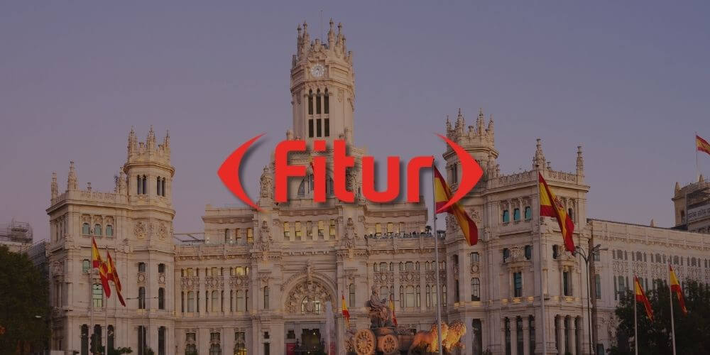 Fitur's logi with Madrid in background