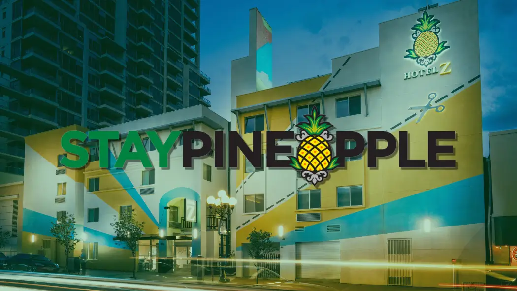 Staypineapple logo with hotel in background